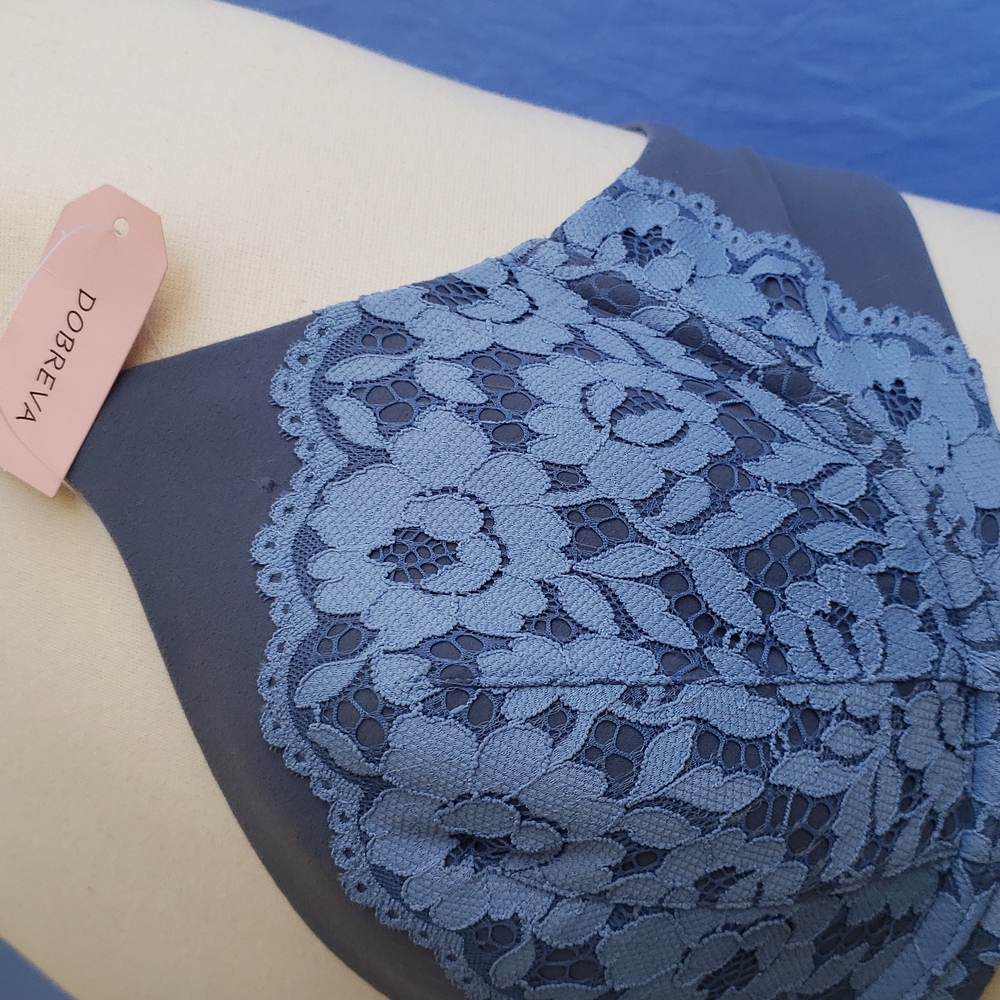 34C supportive bra. Very comfortable.  Blue with lace